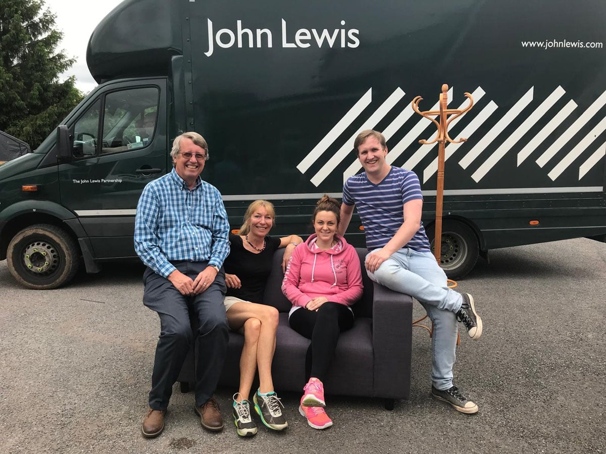 The Randalls team seated together outdoors