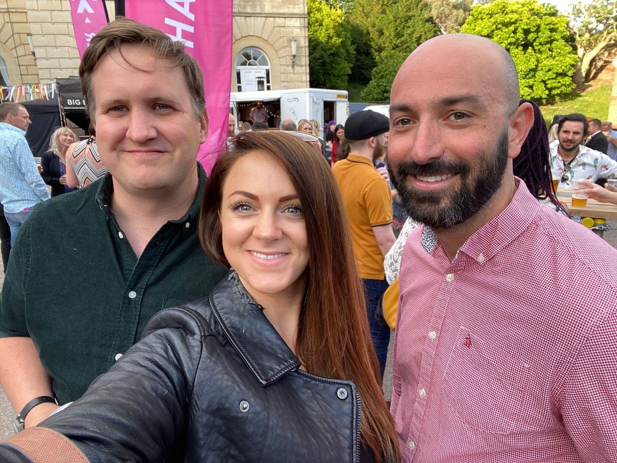 Team members enjoying a summer social event